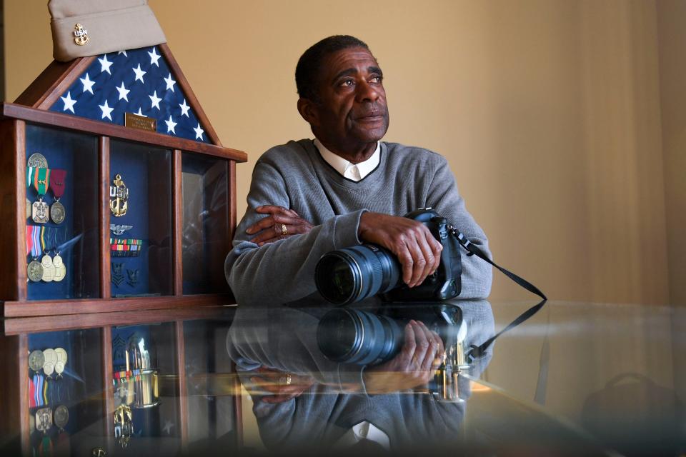 Alex Hicks Jr., photo editor of Gannett's SC publications, the News, Herald-Journal and Independent Mail, and former U.S. Navy Chief Petty Officer, poses for a portrait in his home in Spartanburg, SC, on Wednesday, Nov. 8, 2023.
