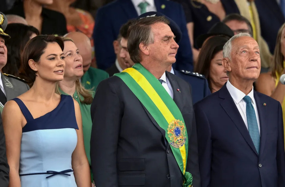 Brazilian President Jair Bolsonaro (C), First Lady Michelle Bolsonaro (L) and Portugal's President Marcelo de Souza attend a military parade to mark Brazil's 200th anniversary of independence in Brasilia, on September 7, 2022. (Photo by EVARISTO SA / AFP) (Photo by EVARISTO SA/AFP via Getty Images)