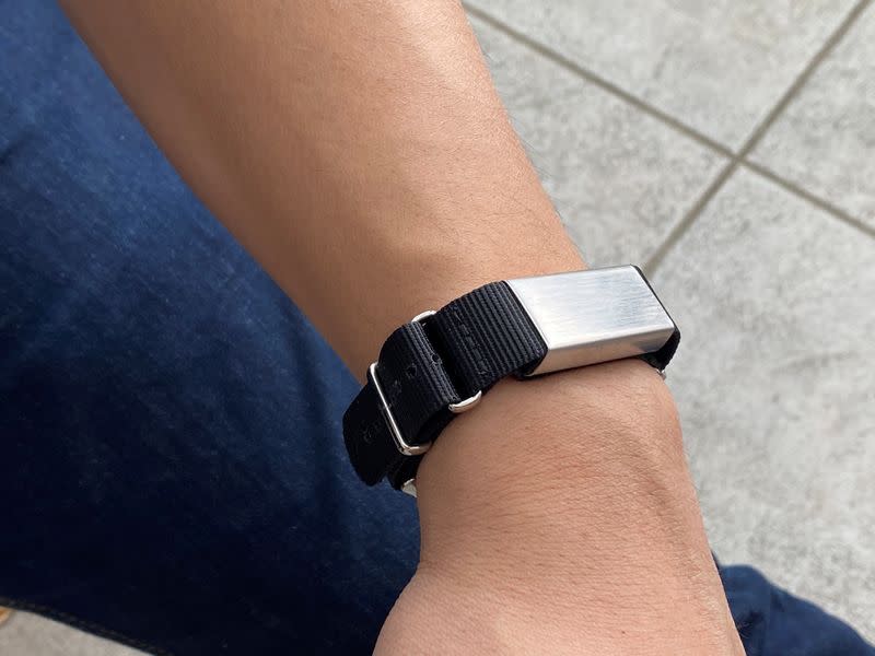 A smartband is pictured on a hand of an entrepreneur Justin Ith, co-founder of the company Slightly Robot, the Immutouch in Seattle