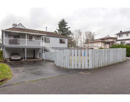 <p><a rel="nofollow noopener" href="https://www.zoocasa.com/new-westminster-bc-real-estate/4287310-631-cumberland-street-new-westminster-bc-v3l5b7-r2125668" target="_blank" data-ylk="slk:631 Cumberland Street, New Westminster, B.C.;elm:context_link;itc:0;sec:content-canvas" class="link ">631 Cumberland Street, New Westminster, B.C.</a><br> This home is located on a 6,048 square foot lot in University Heights, across the street from the Canada Games Pool.<br> Photo courtesy Zoocasa </p>