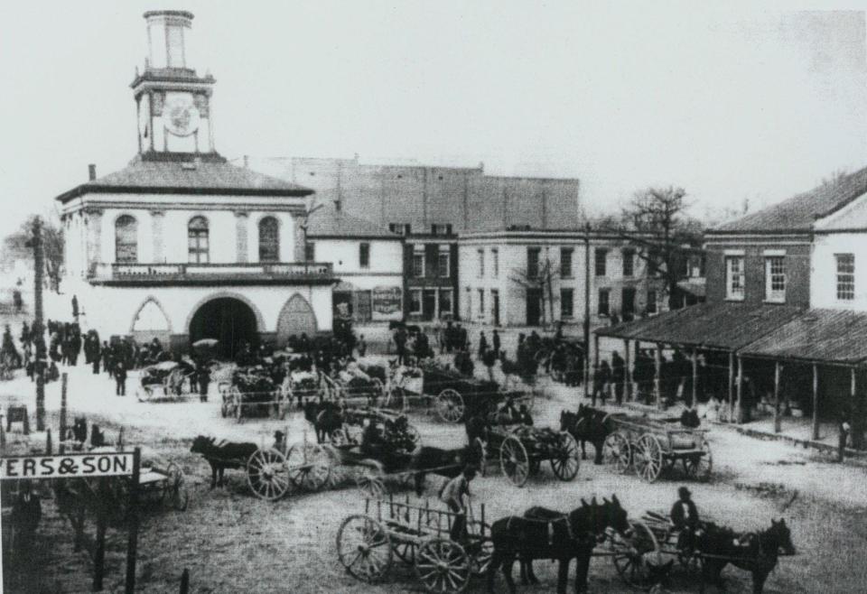 Market Square, with the Market House, from the Weeks Parker book, “Fayetteville, North Carolina: A Pictorial History.” The Market House was completed in 1832, a year after a fire destroyed much of Fayetteville's downtown. This photo was shot around 1900.