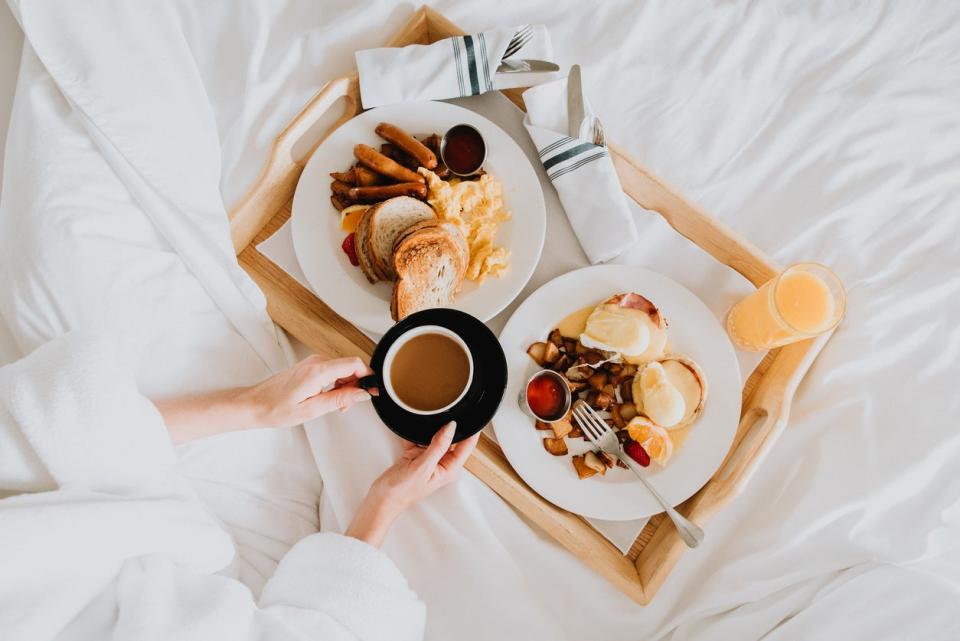 Breakfast in bed with no to-do list beckoningGetty