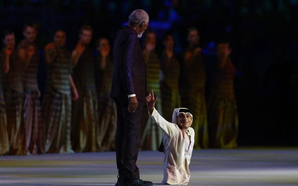 Morgan Freeman and Ghanim al Muftah during the opening ceremony - Reuters/Kai Pfaffenbach