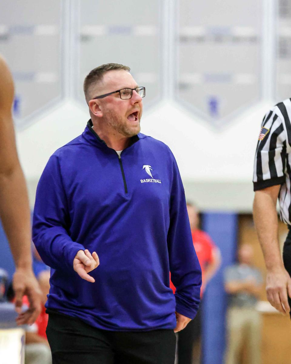 Falcons Head Coach Tommy Smith yells out instructions to his team. Cedar Crest came back and was able to secure a victory over cross town rival Lebanon 55-48 in the Cage Saturday night.