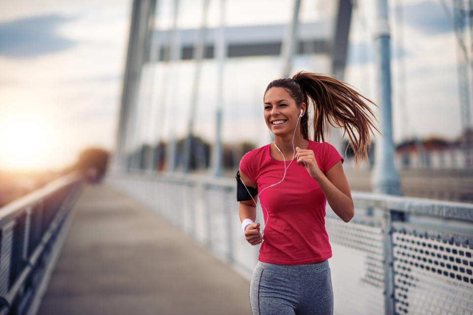 Never give up.Female running in the city.