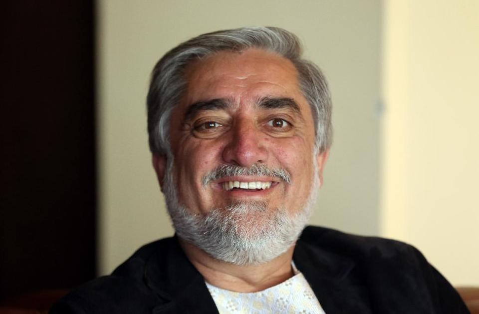 Afghan presidential candidate Abdullah Abdullah speaks during an interview with The Associated Press at his residence in Kabul, Afghanistan, Sunday, April 13, 2014. Shortly after partial results were announced, Abdullah said that he will seek a unity government and that he has held talks with rival Zalmai Rassoul but that it is premature to discuss a possible alliance. (AP Photo/Massoud Hossaini)