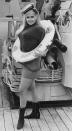 <p>Jayne Mansfield dons a turtleneck, miniskirt, and life preserver, as she poses on the back of a boat in 1967. </p>