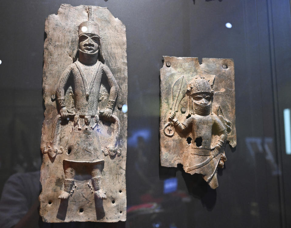 Benin bronzes objects are displayed at the Linden Museum in Stuttgart, Germany, Wednesday June 29, 2022 . The ethnological museum houses 78 objects, including 64 bronzes,from the former royal house of Benin, whose core area is located in what is now southwestern Nigeria. Germany is set to sign an agreement in Nigeria that paves the way for the return of important sculptures known as the Benin Bronzes that were taken from Africa in the late 19th century. (Bernd Weissbrod/dpa via AP)