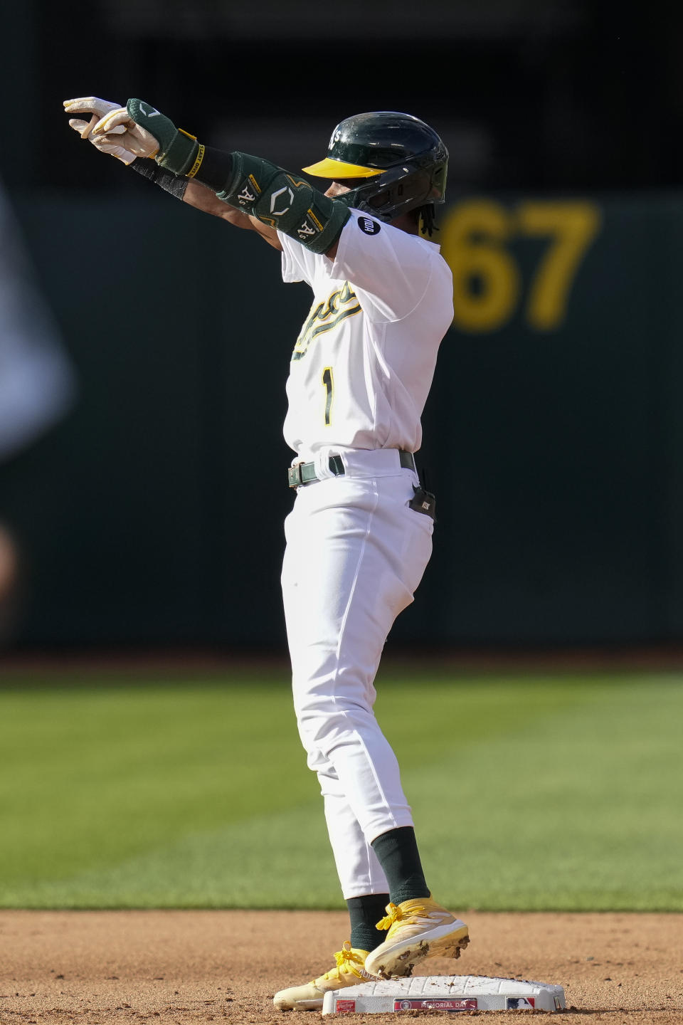 Oakland Athletics' Esteury Ruiz celebrates after hitting an RBI-single against the Atlanta Braves during the fifth inning of a baseball game in Oakland, Calif., Monday, May 29, 2023. (AP Photo/Godofredo A. Vásquez)