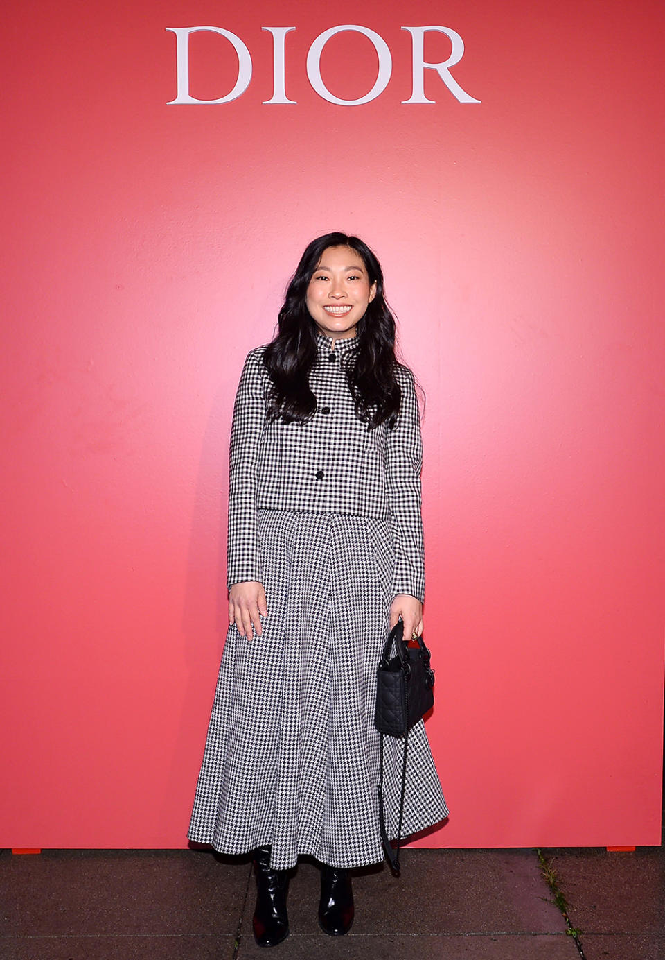 BEVERLY HILLS, CALIFORNIA - FEBRUARY 05: Awkwafina attends as Dior and Peter Philips celebrate Rouge Dior at La Dolce Vita on February 05, 2024 in Beverly Hills, California. (Photo by Donato Sardella/Getty Images for Christian Dior Parfums )