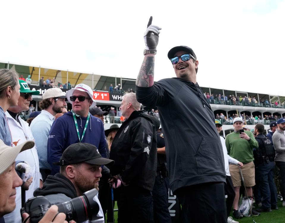 Country music singer and songwriter Hardy prepares to take a shot during the WHOOP Shot at Glory on the 16th hole at TPC Scottsdale on Feb. 7, 2024.