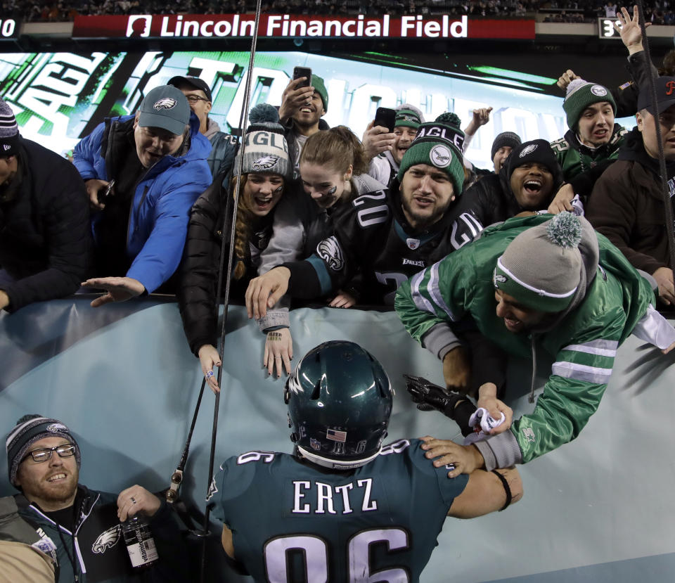 Eagles fans are in the giving mood on their way to the Super Bowl. (AP Photo/Matt Rourke)