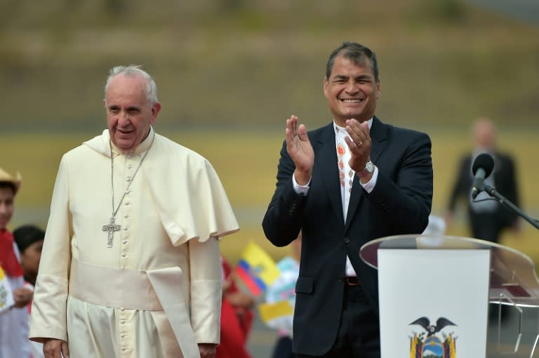 Pope Francis is welcomed by Ecuadorean President Rafael Correa upon his arrival in Quito on July 5, 2015