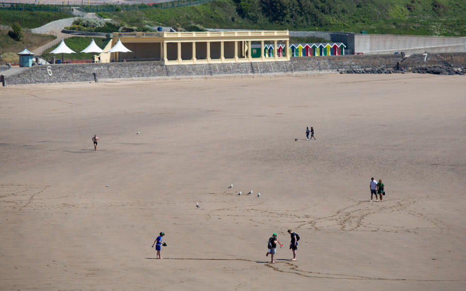 A very quiet Barry Island Beach on the hottest day of the year as police block cars from parking near the promenade.