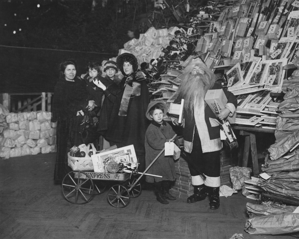 Santa Claus visits the 9th Regiment Armory on 14th Street, New York City