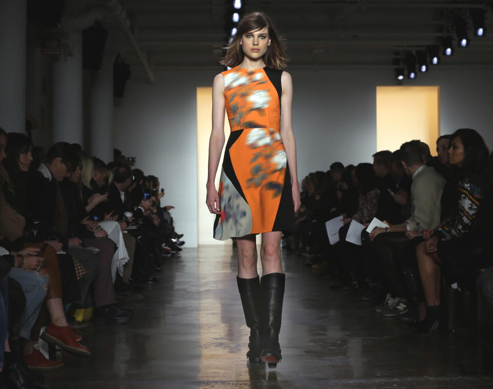 The Peter Som Fall 2014 collection is modeled during Fashion Week in New York, Friday, Feb. 7, 2014. (AP Photo/Richard Drew)