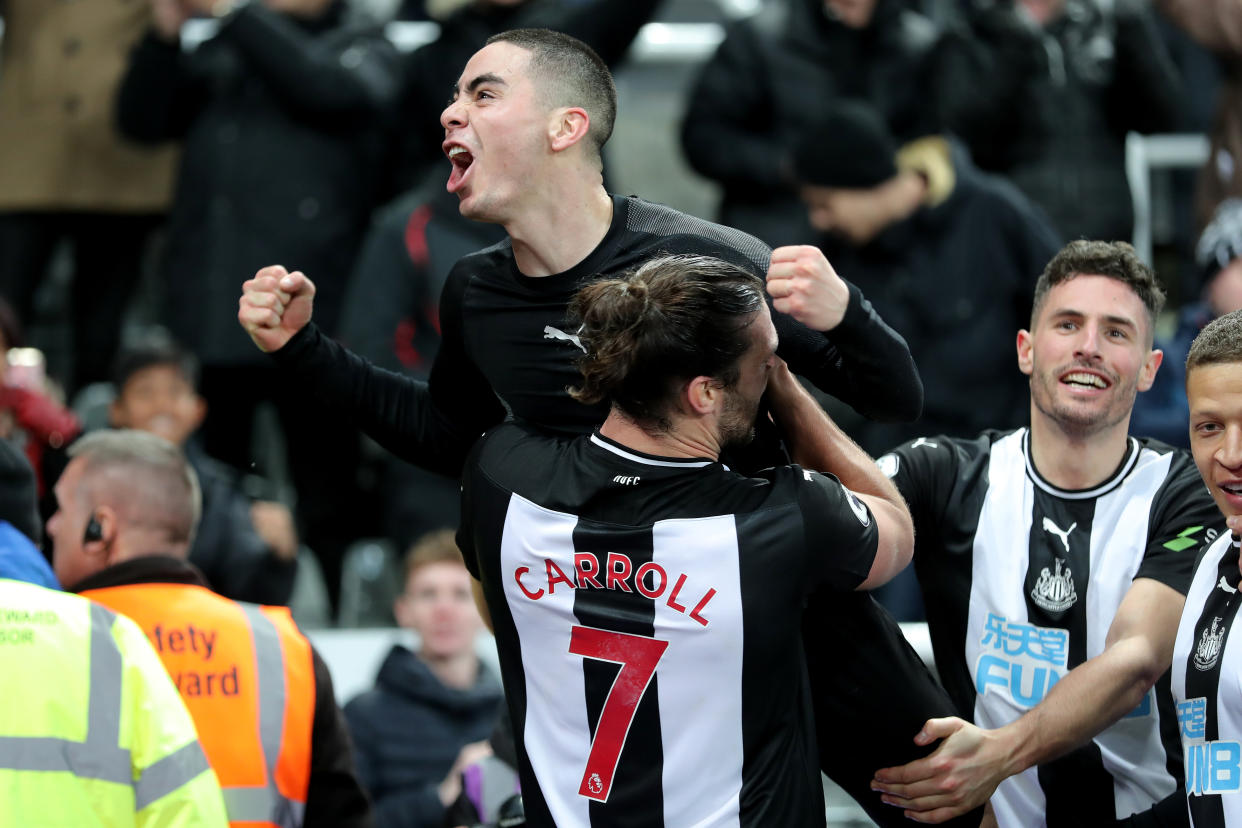 Newcastle United's Miguel Almiron celebrates his goal with Newcastle United's Andy Carroll Newcastle United v Crystal Palace - Premier League - St James' Park 21-12-2019 . (Photo by  Richard Sellers/EMPICS/PA Images via Getty Images)