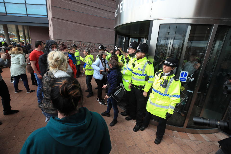 Police guard the entrance to the Liverpool hospital (PA)