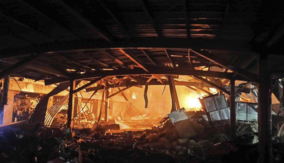 This image provided by the Pingtung County Government shows a factory fire at golf ball manufacturer Launch Technologies Co. in the southern county of Pingtung in Taiwan on Friday, Sept. 22, 2023. The factory fire has left multiple people killed, and the victims include several firefighters, according to Taiwanese media reports. (Pingtung County Government via AP)