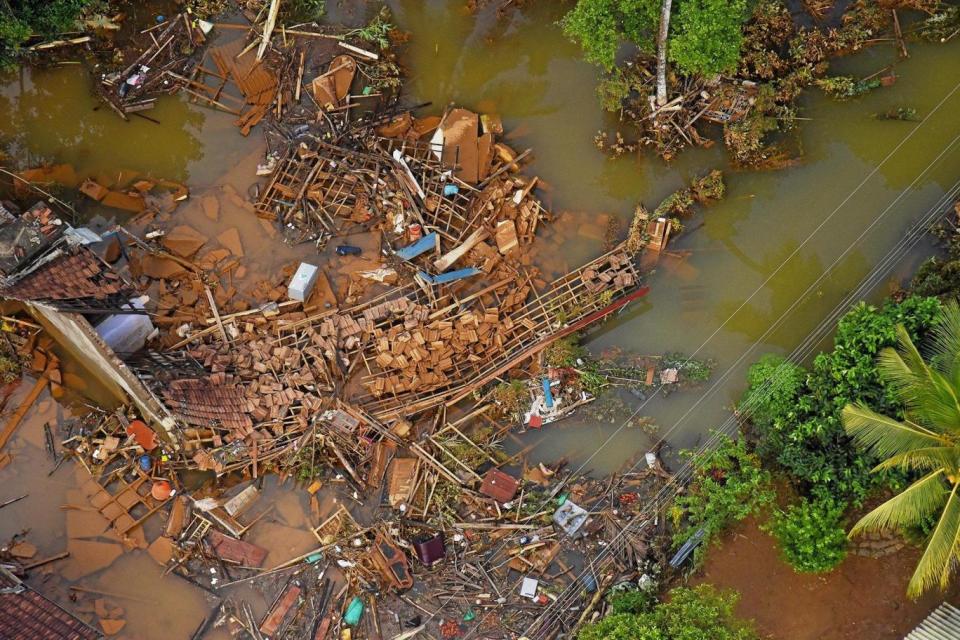 Debris: A flood-stricken village in Matara, Sri Lanka (REUTERS)