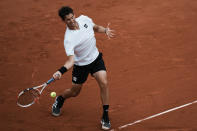 Austria's Dominic Thiem plays a shot against Bolivia's Hugo Dellien during their first round match at the French Open tennis tournament in Roland Garros stadium in Paris, France, Sunday, May 22, 2022. (AP Photo/Thibault Camus)