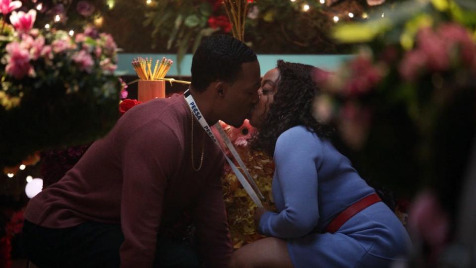 Gregory and Janine kissing in the living classroom in Abbott Elementary