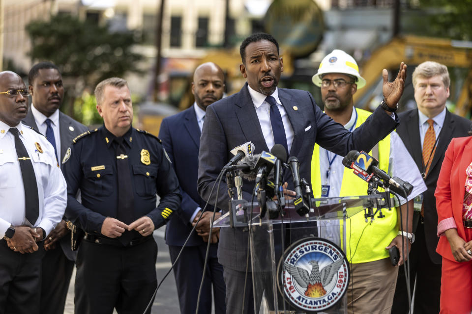 Atlanta Mayor Andre Dickens speaks during a news conference, Monday, June 3, 2024, in Atlanta. A water outage shut down businesses and left faucets dry at many homes in the area. City officials say water was shut down as part of a successful effort to stanch the flow from a broken water main. It had been gushing a river into the streets since Friday night. (John Spink/Atlanta Journal-Constitution via AP)