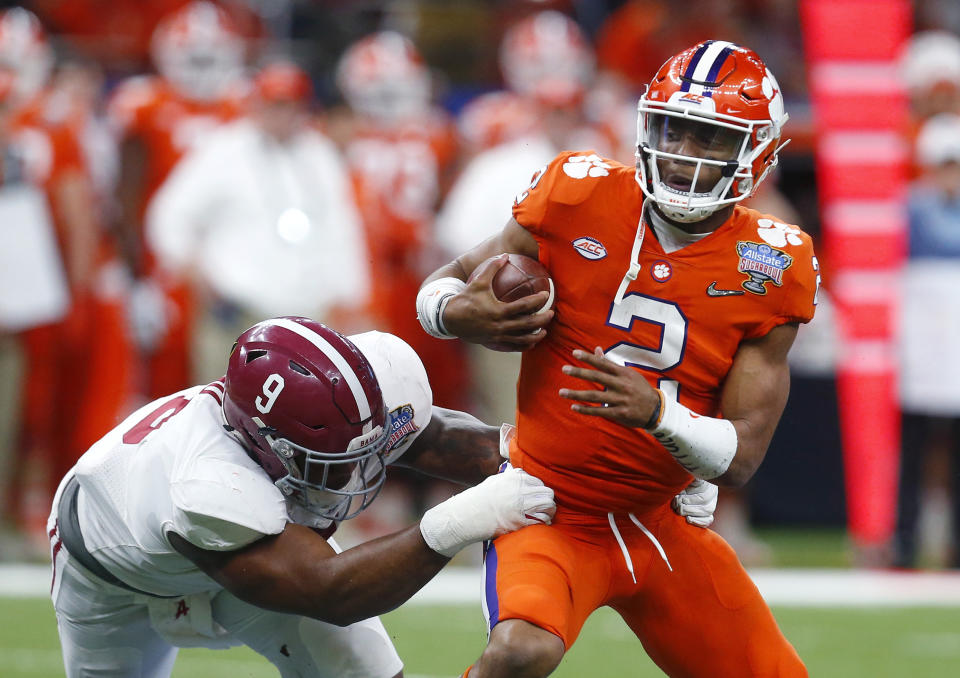 Clemson quarterback Kelly Bryant (2) is sacked by Alabama defensive lineman Da’Shawn Hand (9) in the second half of the Sugar Bowl semi-final playoff game for the NCAA college football national championship, in New Orleans, Monday, Jan. 1, 2018. (AP Photo/Butch Dill)