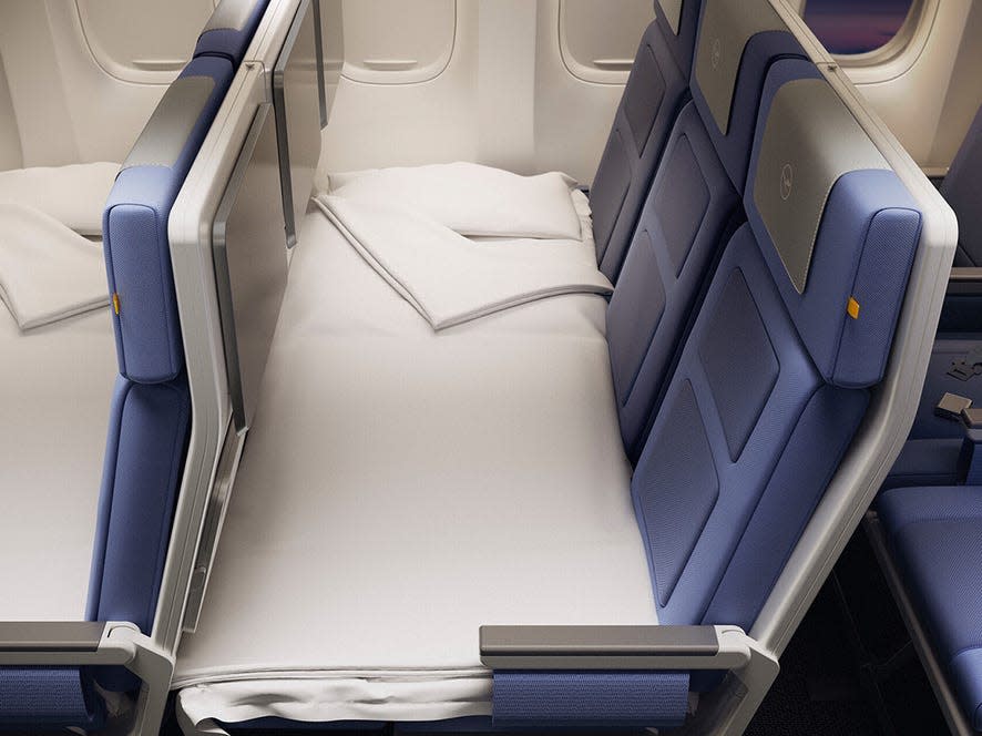 Lufthansa's "Sleeper's Row 2.0" with white bedding.