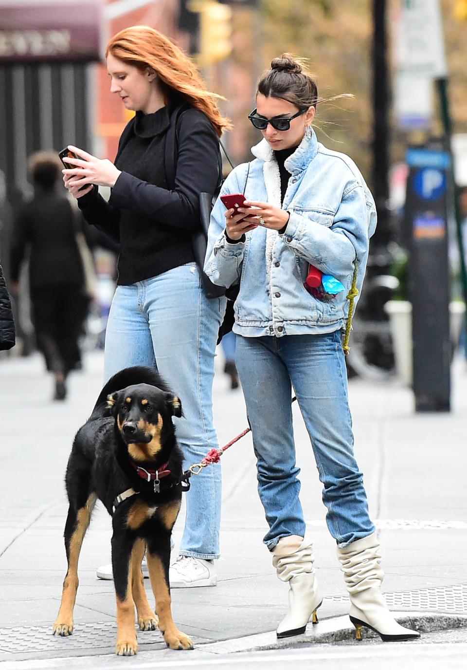 Emily Ratajkowski demonstrates how to wear booties with jeans the retro way.