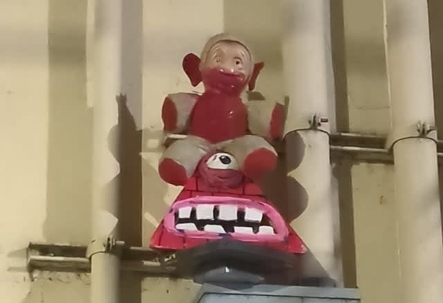 a weird doll pyramid