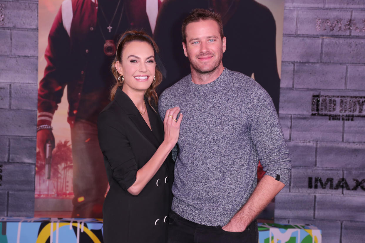 HOLLYWOOD, CALIFORNIA - JANUARY 14: (L-R) Elizabeth Chambers Hammer and Armie Hammer attend Premiere Of Columbia Pictures' 