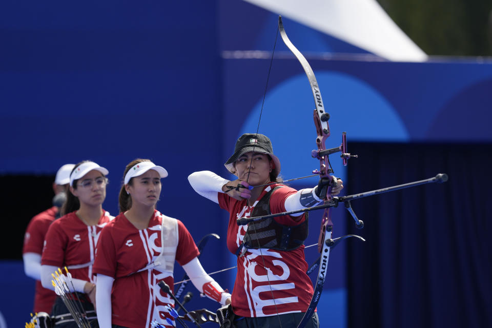 Mexico's Alejandra Valencia shoots during the Archery women's team semifinals competition against China at the 2024 Summer Olympics, Sunday, July 28, 2024, in Paris, France. (AP Photo/Rebecca Blackwell)