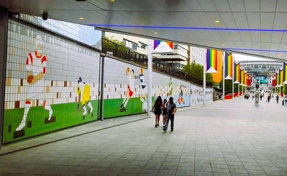 Sports heritage murals on east wall of Olympic Way (Philip Grant)