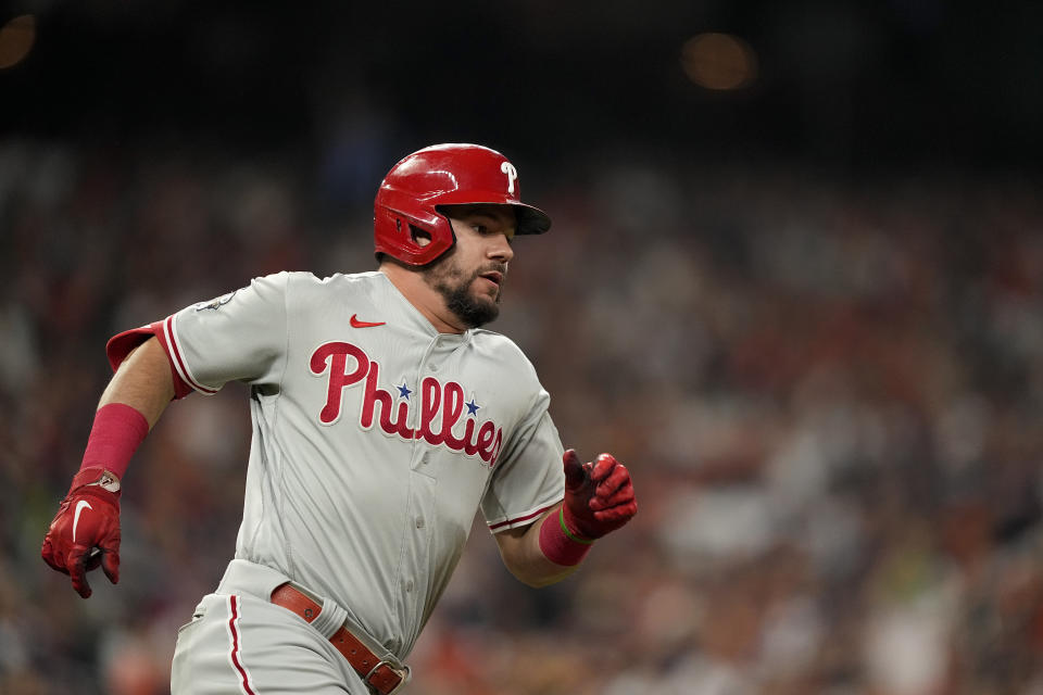 Philadelphia Phillies' Kyle Schwarber runs after hitting a single during the third inning in Game 2 of baseball's World Series between the Houston Astros and the Philadelphia Phillies on Saturday, Oct. 29, 2022, in Houston. (AP Photo/David J. Phillip)