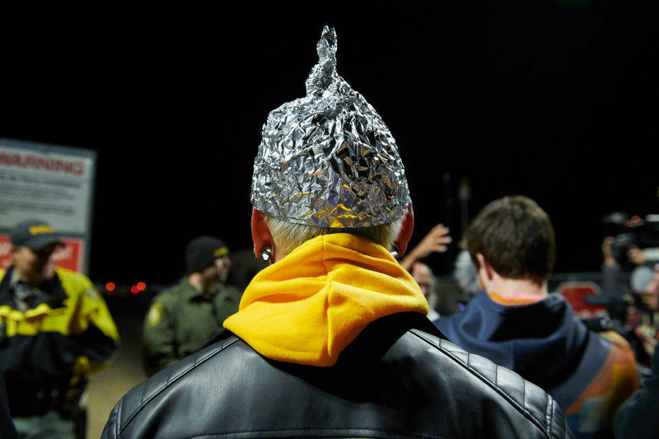Attendee Daniel Rodriguez wears at tinfoil hat as he and other Alien hunters gathered to "storm" Area 51 at an entrance near Rachel, Nevada on Sept. 20, 2019. (Photo: Bridget Bennett/AFP/Getty Images)