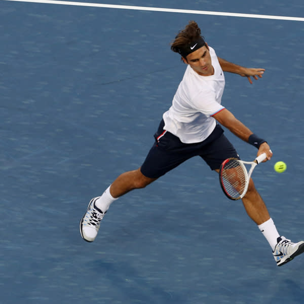 Roger Federer of Switzerland hits a forehand against Alex Bogomolov Jr. of Russia during day five of the Western & Southern Open at Lindner Family Tennis Center on August 15, 2012 in Mason, Ohio. (Photo by Nick Laham/Getty Images)