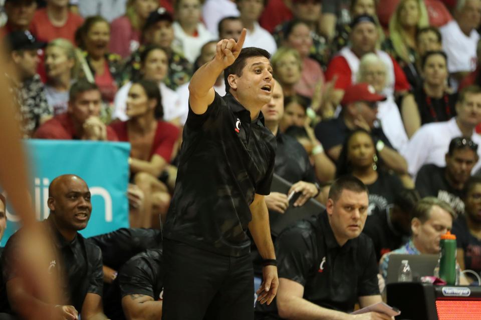 Cincinnati coach Wes Miller reacts to a play against Arizona on Nov. 21 in the Maui Invitational. The Bearcats lost to the Wildcats, 101-93.