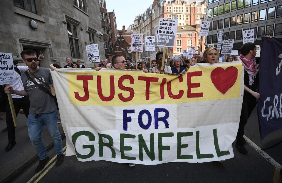 <p>Protestors marched through London today (June 21) seeking justice for the Grenfell victims and survivors. (GETTY) </p>