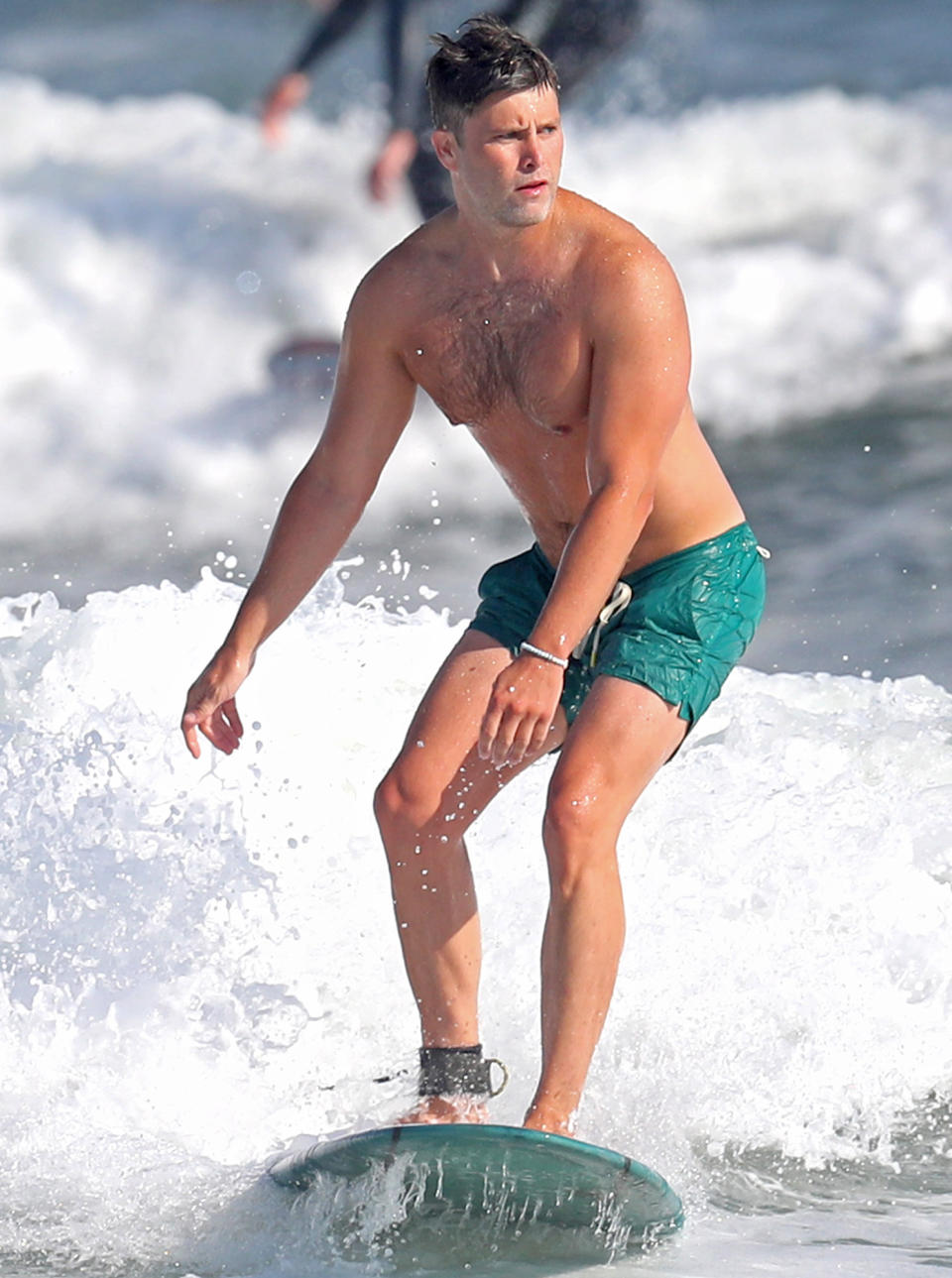 <p>Colin Jost hits the beach on Thursday, enjoying some surfing in The Hamptons, New York.</p>