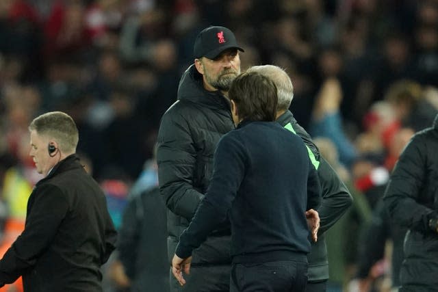 Jurgen Klopp, left, and Antonio Conte shake hands at the end of Saturday's match 