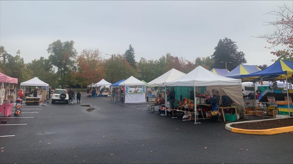Cloudy skies blanket Salem before the eclipse Saturday morning at the Salem Saturday Market.