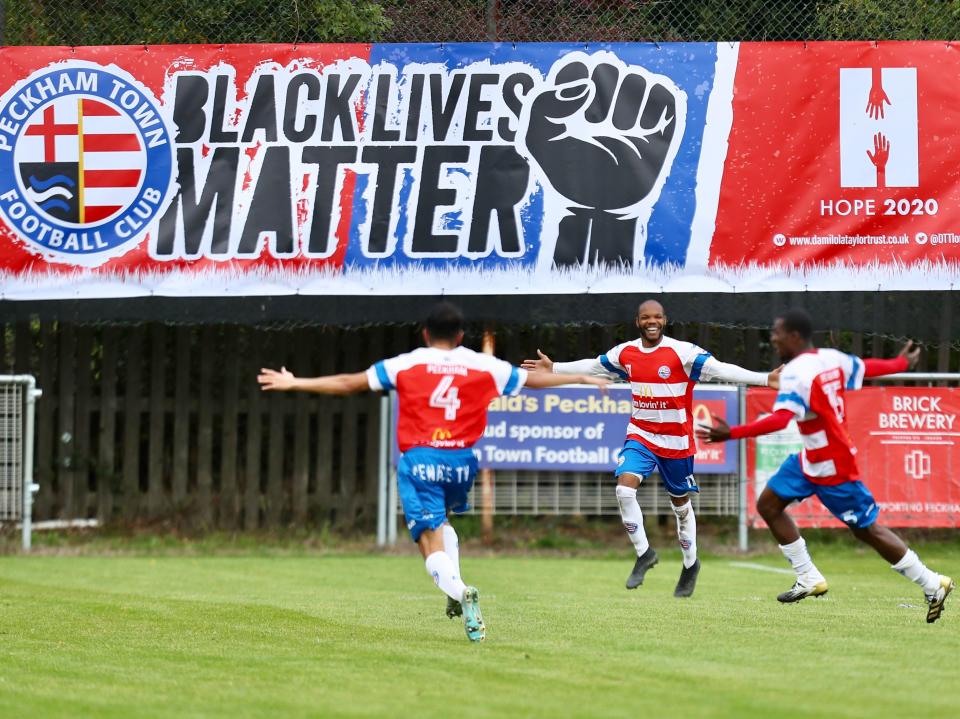 <p>A Black Lives Matter banner is displayed at Peckham Town</p>Avis Action Images