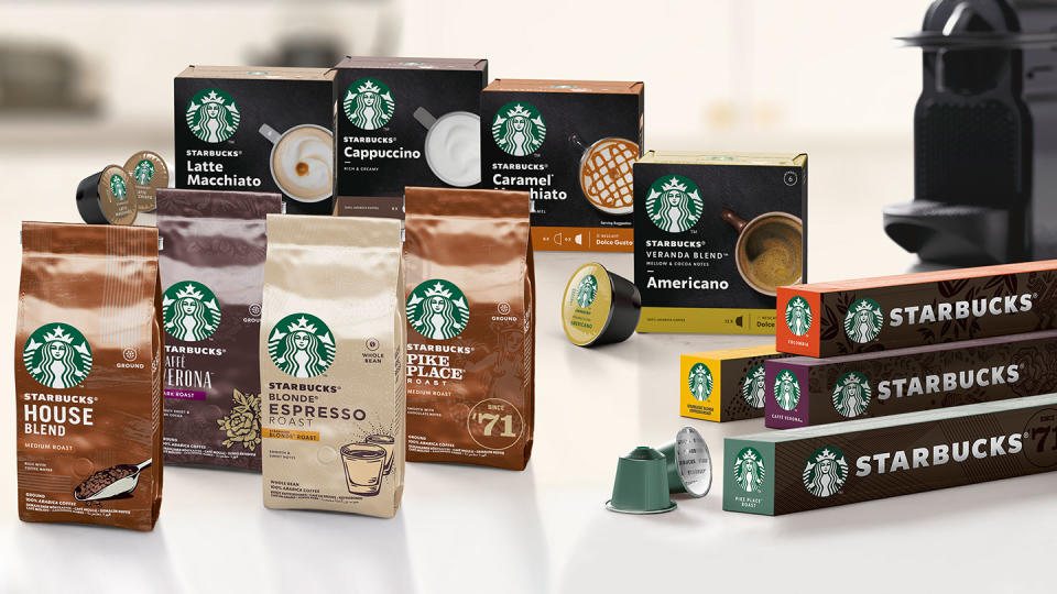 Several bags and boxes of Starbucks coffee.