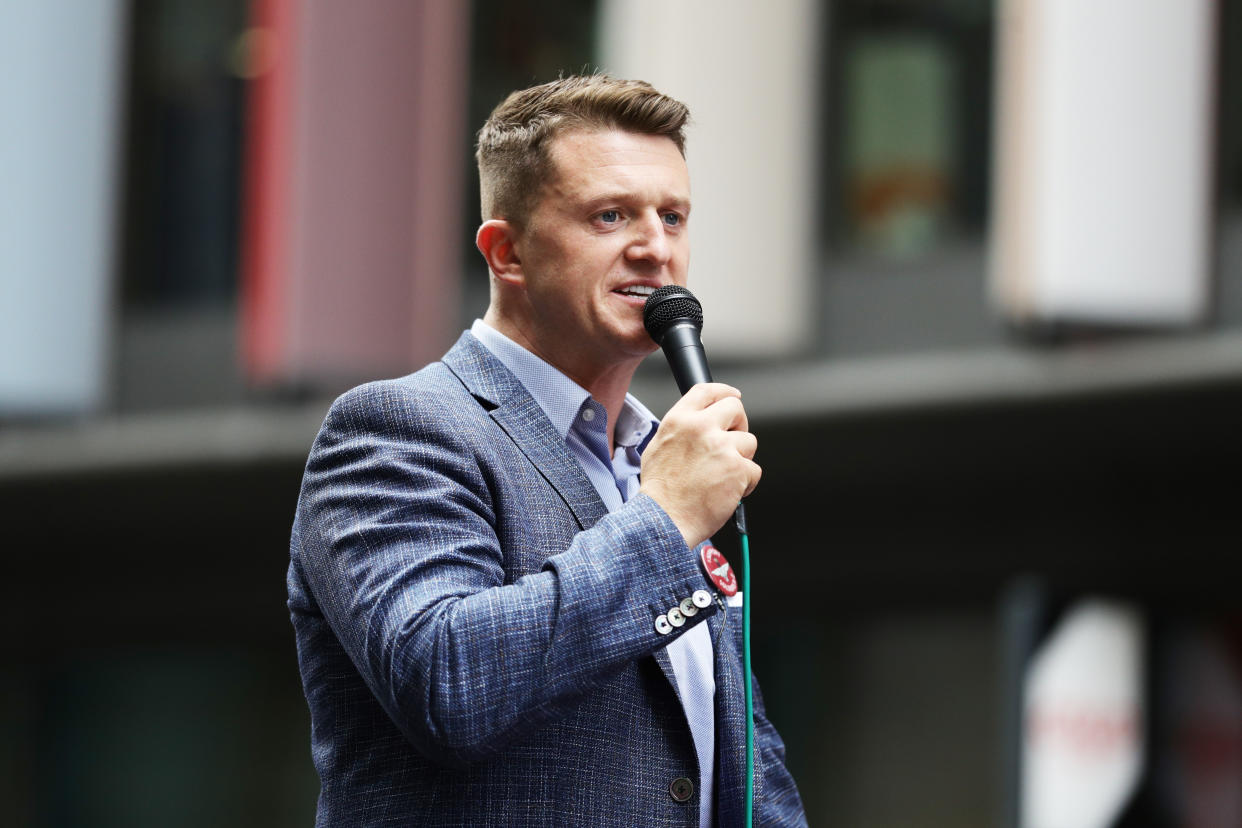 Tommy Robinson outside the Old Bailey in London after being found in contempt of court by High Court judges for filming defendants in a criminal trial and broadcasting the footage on social media.