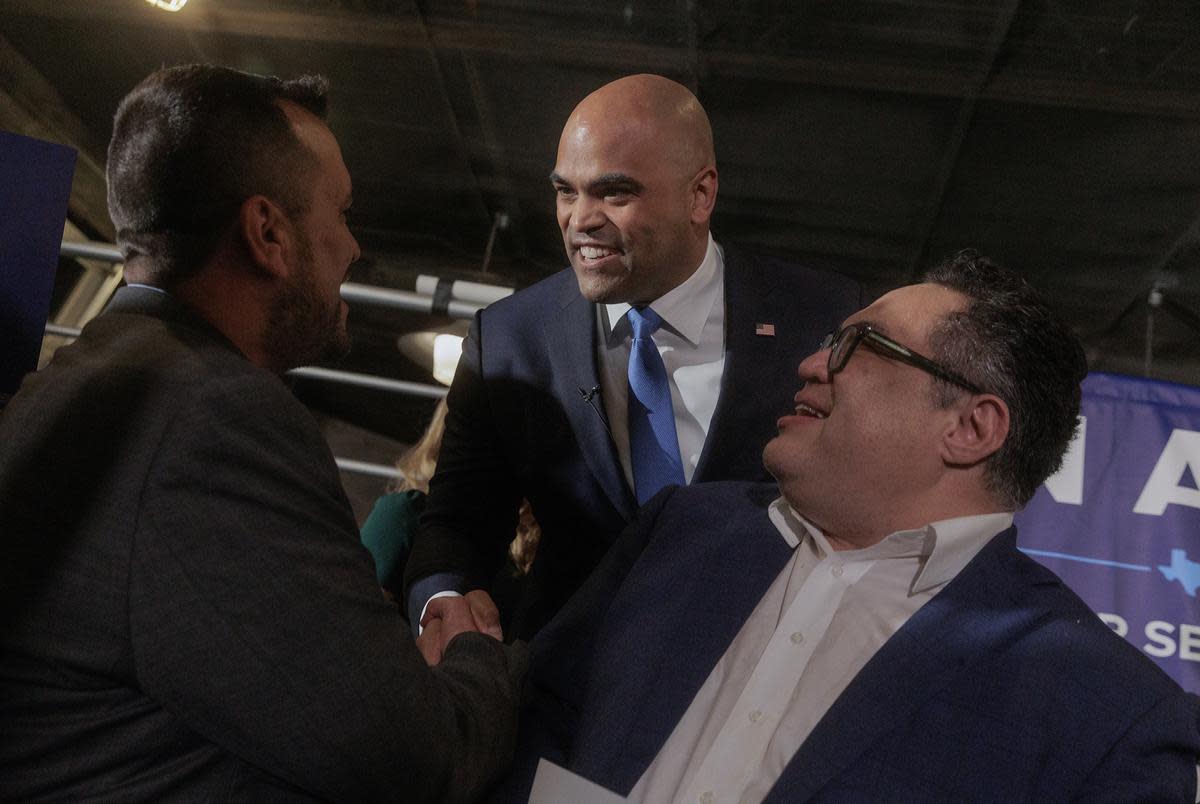 U.S. Rep. Colin Allred shakes hands with Dallas City Council members Adam Bazaldua and Omar Narvaez during a campaign watch party for the Senate seat in Dallas, TX on primary election day, March 5, 2024.