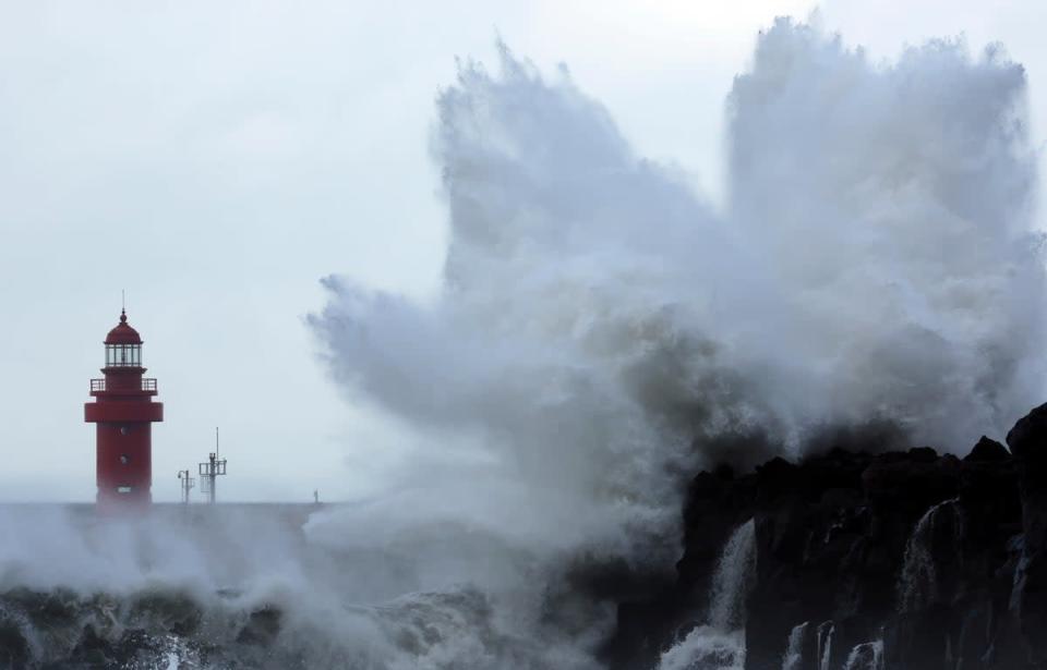 Waves crash on the eastern coast of Jeju Island, South Korea, as a previous storm – Typhoon Hinnamnor – travels toward the Korean peninsula (AP)