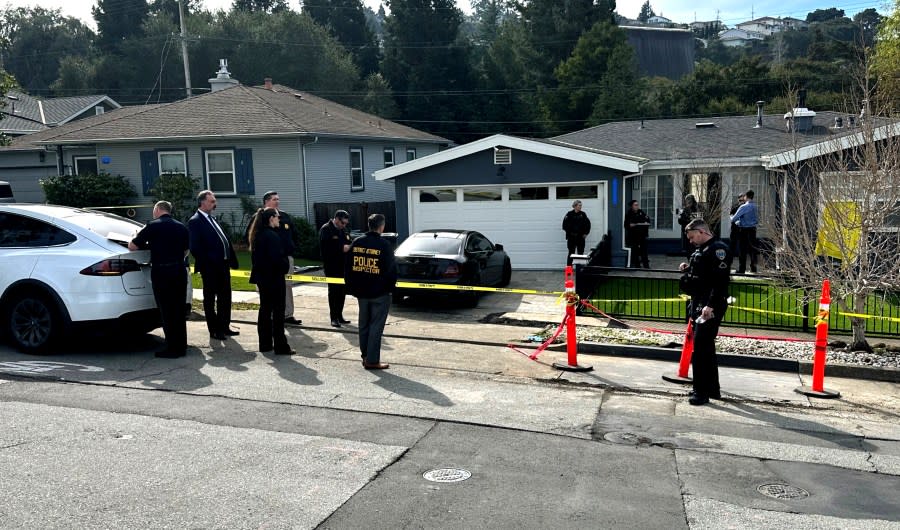 Investigators search a house where a family of four was found dead. (Photo courtesy San Mateo Police Department)