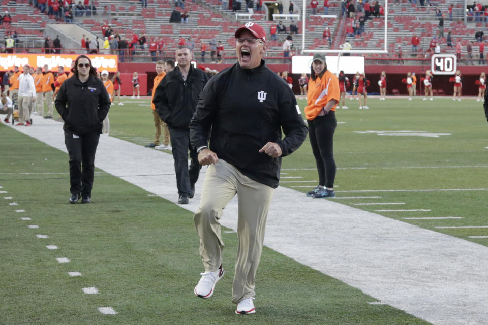 Indiana head coach Tom Allen runs to celebrate with supporters after Indiana's win over Nebraska in an NCAA college football game in Lincoln, Neb., Saturday, Oct. 26, 2019. (AP Photo/Nati Harnik)