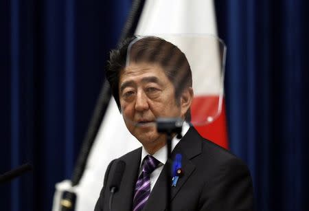 Japan's Prime Minister Shinzo Abe attends a news conference at his official residence in Tokyo in this July 1, 2014 file photo. REUTERS/Yuya Shino/Files